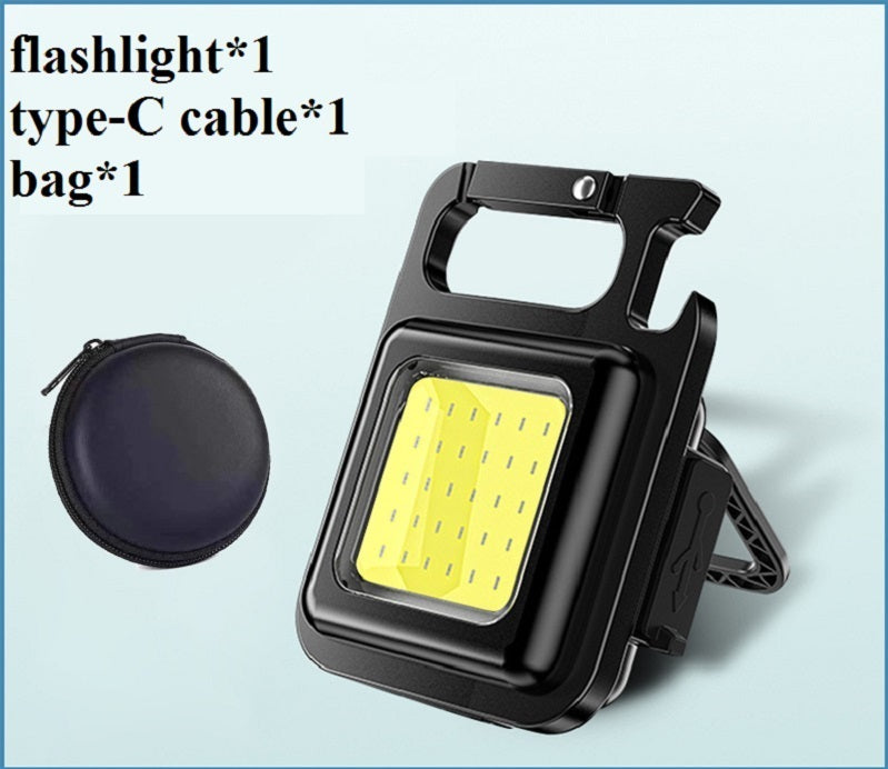 Portable COB keychain work light shown in use