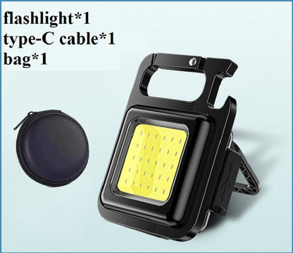 Portable COB keychain work light shown in use