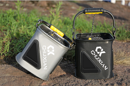 Two portable fishing buckets on a natural background.