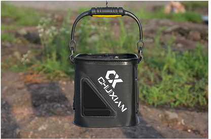 Black bucket with a handle and visible brand logo on a blurred natural background